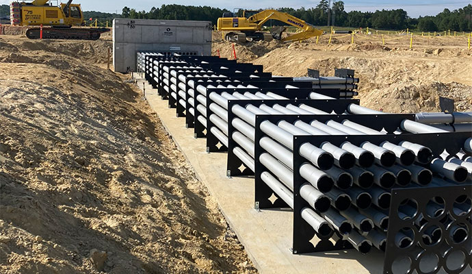 Conduit spacers supporting multiple pipes